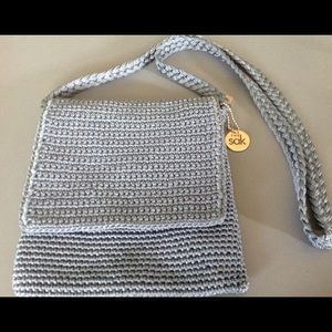 The Sak blue cross body small purse handbag